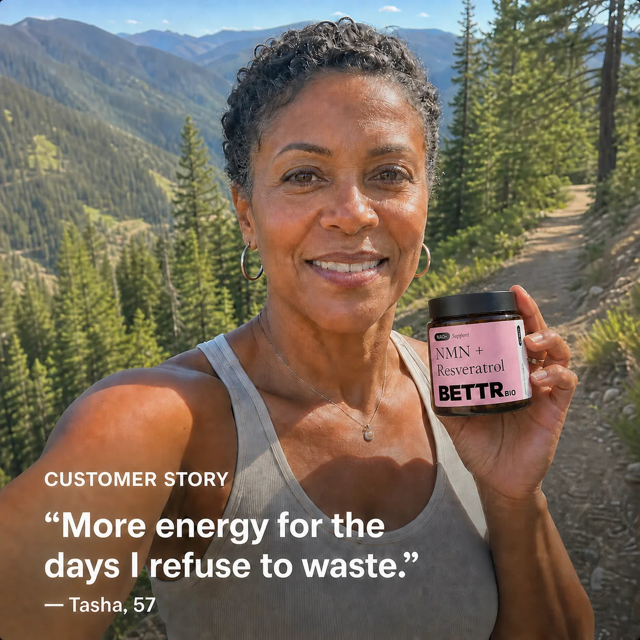 Customer on a mountain trail holding Bettr Bio NMN + Resveratrol
