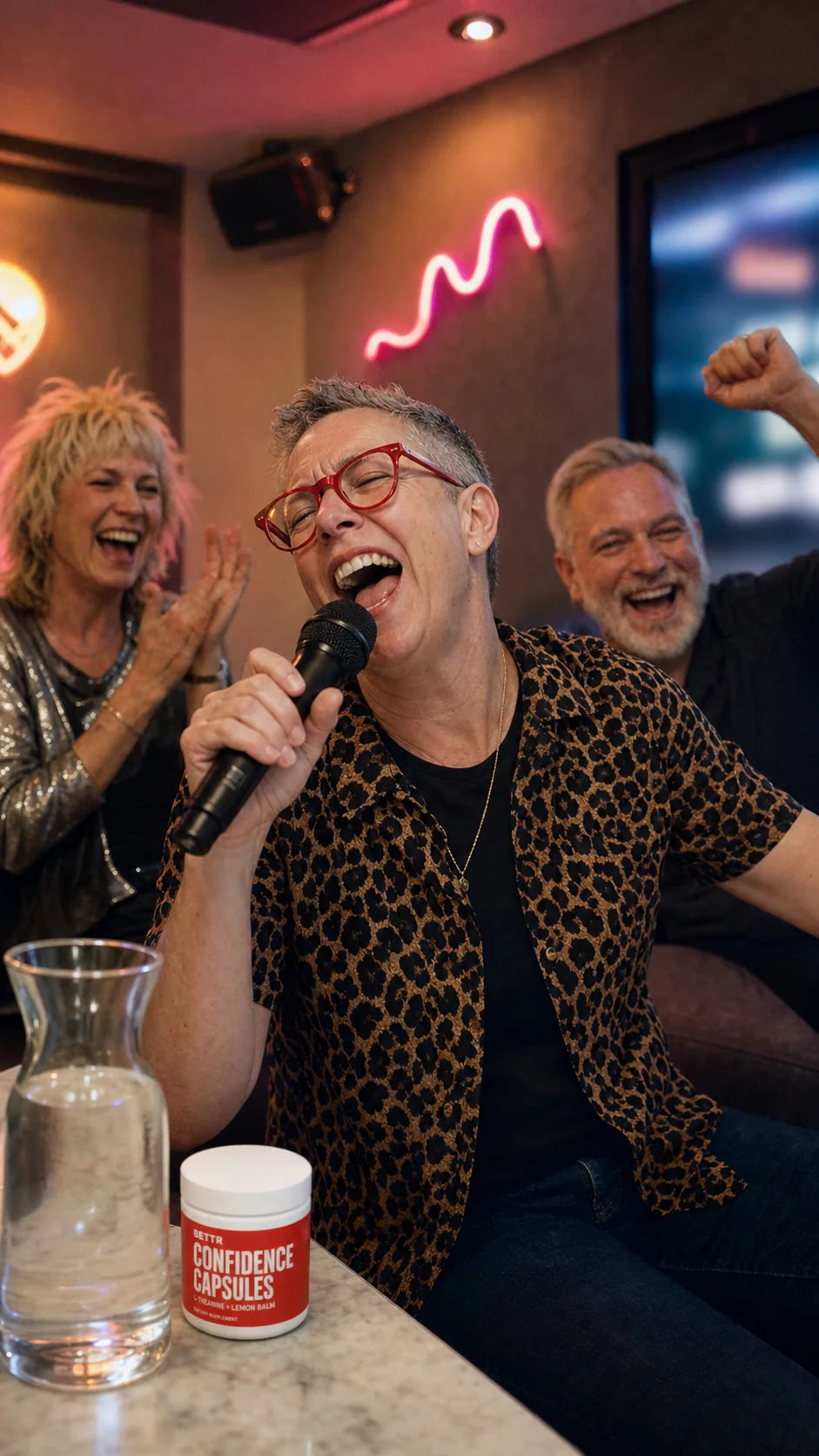 Person singing karaoke while friends cheer