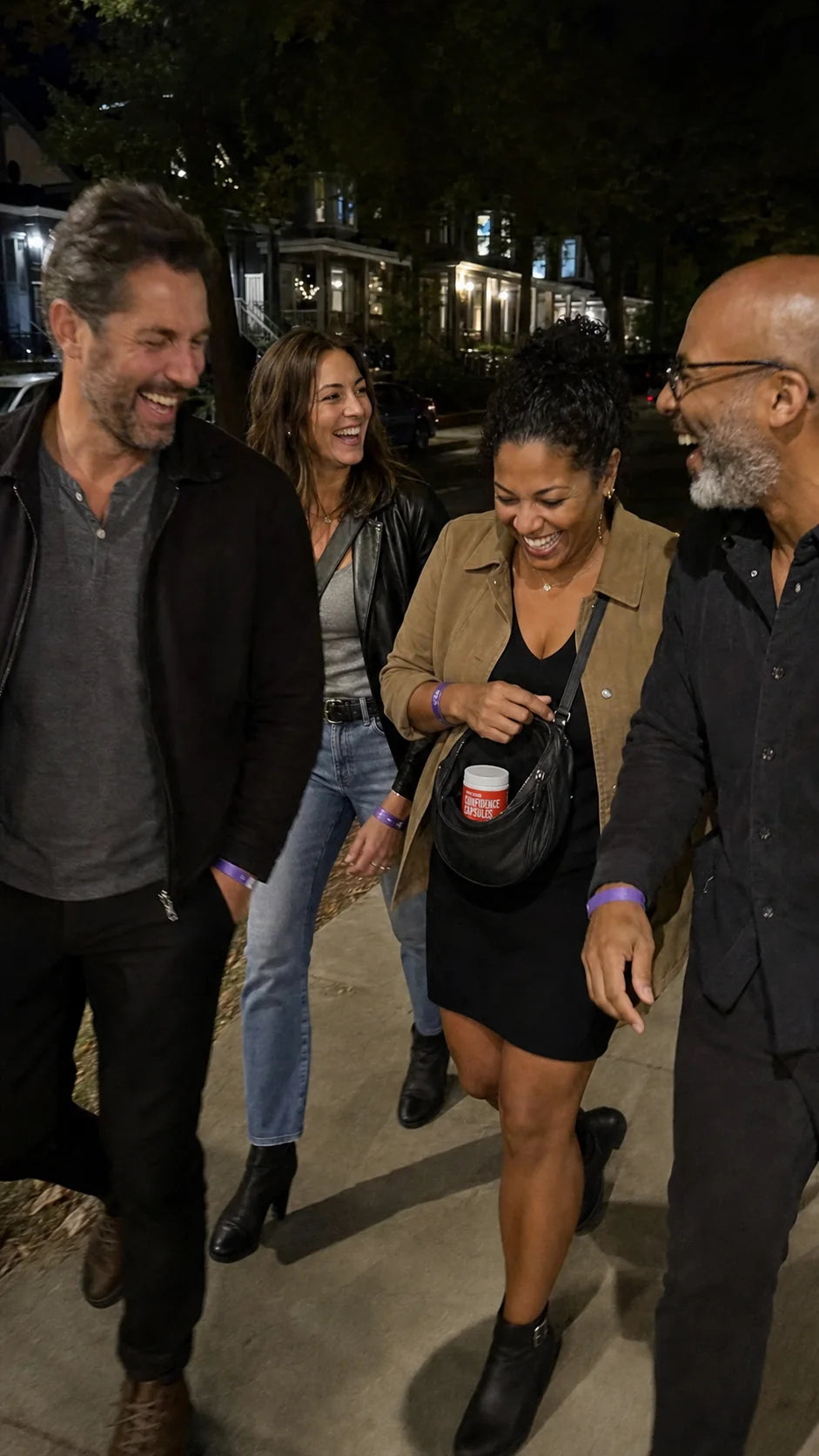 Friends laughing together while walking home after a comedy show