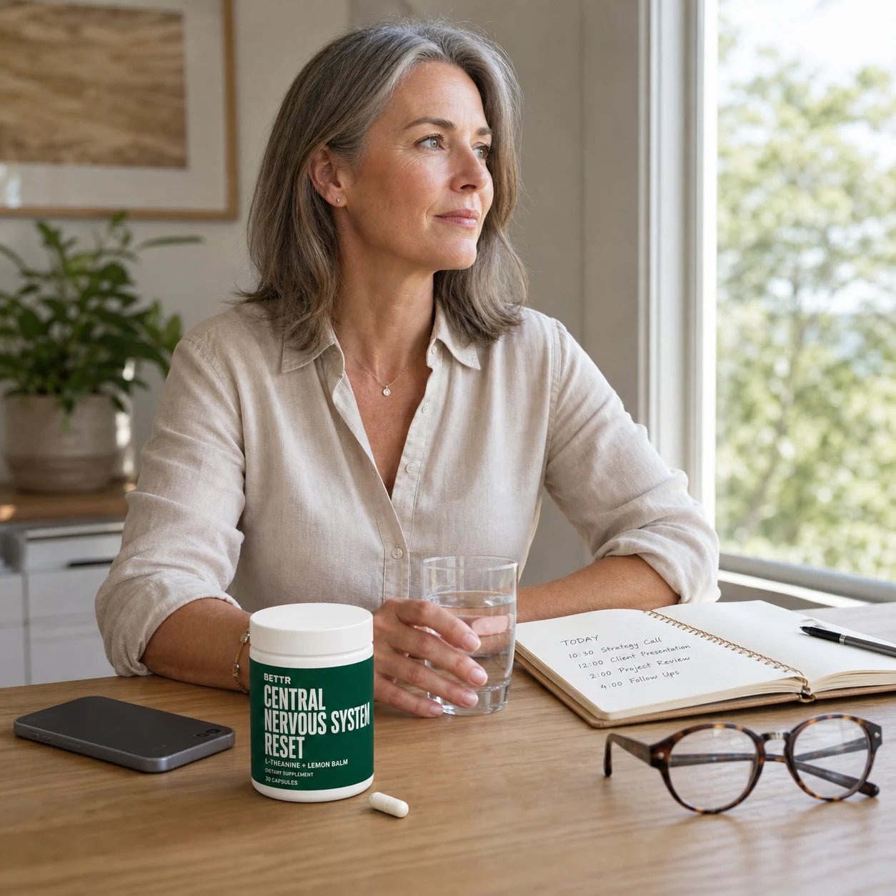 Woman calmly planning a demanding day with Central Nervous System Reset
