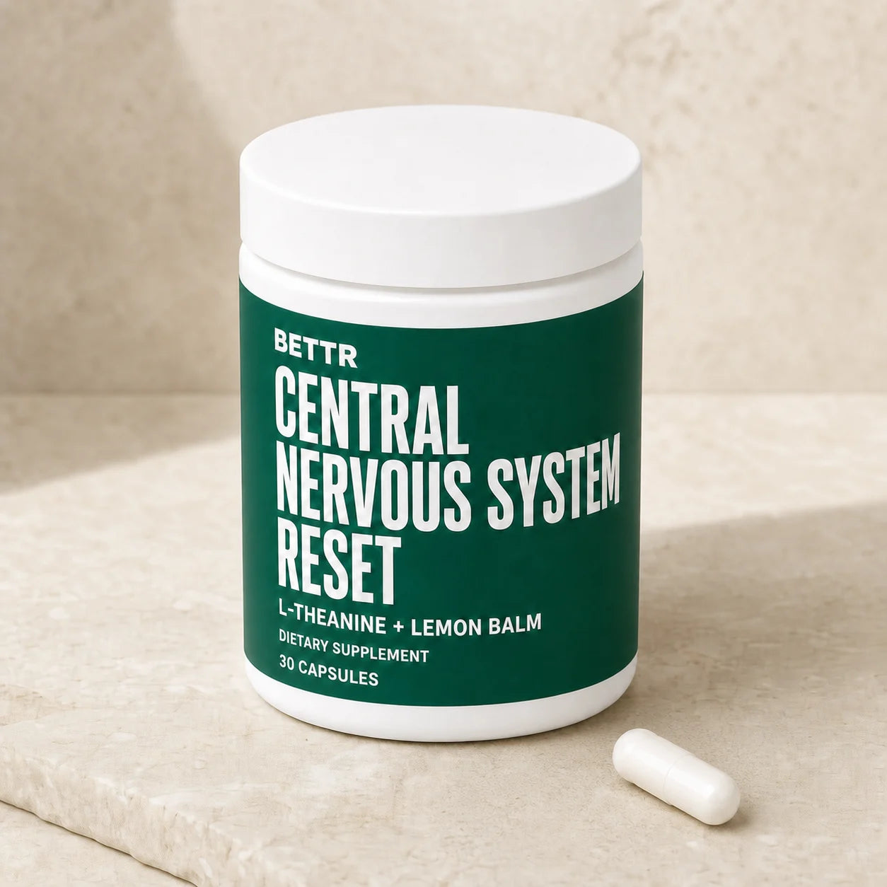 Central Nervous System Reset bottle on a warm mineral studio set